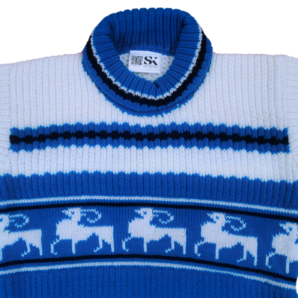 Blue and White Reindeer Design Woolen Sweater for Kids Keep your little ones warm and stylish this winter with the Blue and White Reindeer Design Woolen Sweater for Kids. Crafted with care, this sweater combines festive charm with everyday practicality, making it perfect for chilly weather. 1. Superior Quality Material Made from premium-quality wool, this sweater ensures optimal warmth and comfort for your child. The soft fabric is gentle on delicate skin, providing an itch-free experience. 2. Adorable Reindeer Design The charming reindeer pattern in blue and white adds a festive and playful touch to the sweater, making it perfect for holiday gatherings, school events, or casual outings. 3. Comfortable Fit for Active Kids Designed for an ideal fit, this sweater allows unrestricted movement, keeping kids comfortable throughout their busy day. Chest: 28 inches Length: 18 inches Shoulder: 13 inches 4. Versatile Winter Essential This sweater is a great choice for various occasions, including: School Events: Ideal for winter celebrations. Family Outings: Keeps your child cozy and stylish. Casual Wear: A perfect blend of comfort and charm. 5. Easy Care Instructions To maintain the sweater's softness and vibrant colors: Hand wash with cold water or use a gentle machine cycle. Avoid using bleach or harsh detergents. Dry flat to retain shape. Product Features Color: Blue and White Design: Festive reindeer pattern for a cheerful winter look Material: High-quality wool for warmth and durability Fit: Regular fit for boys and girls Occasion: Suitable for school events, family outings, or casual wear Sleeves: Full sleeves for maximum coverage and warmth Care: Hand wash recommended for longevity Why Choose This Sweater? Durable and Warm: Premium materials ensure your child stays cozy all winter. Festive Design: The reindeer pattern adds a cheerful touch to any outfit. Unisex Style: Perfect for boys and girls, offering a versatile wardrobe option. Comfortable Fit: Designed to keep up with active kids. FAQs 1. Is this sweater suitable for boys and girls? Yes, its unisex design makes it a great choice for both. 2. How do I care for this sweater? Hand washing is recommended to maintain its quality, but it can also be machine-washed on a gentle cycle. 3. Is this sweater lightweight? Yes, it’s warm yet lightweight, making it comfortable for extended wear. Table of Contents Introduction Material & Design Key Features Care Instructions FAQs Internal Links Explore More Kids Sweaters Shop Winter Essentials for Kids